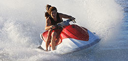 Two People Riding A Waverunner 