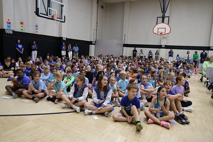 Bluff Park Elementary students in gymnasium attending the 2025-26 Teacher of the Year assembly.