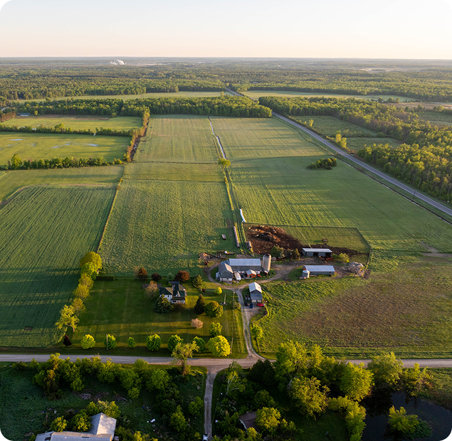 Farm land and house.
