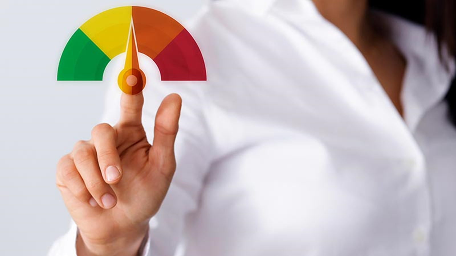 A person pointing at a gauge.