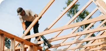 Man building a house.