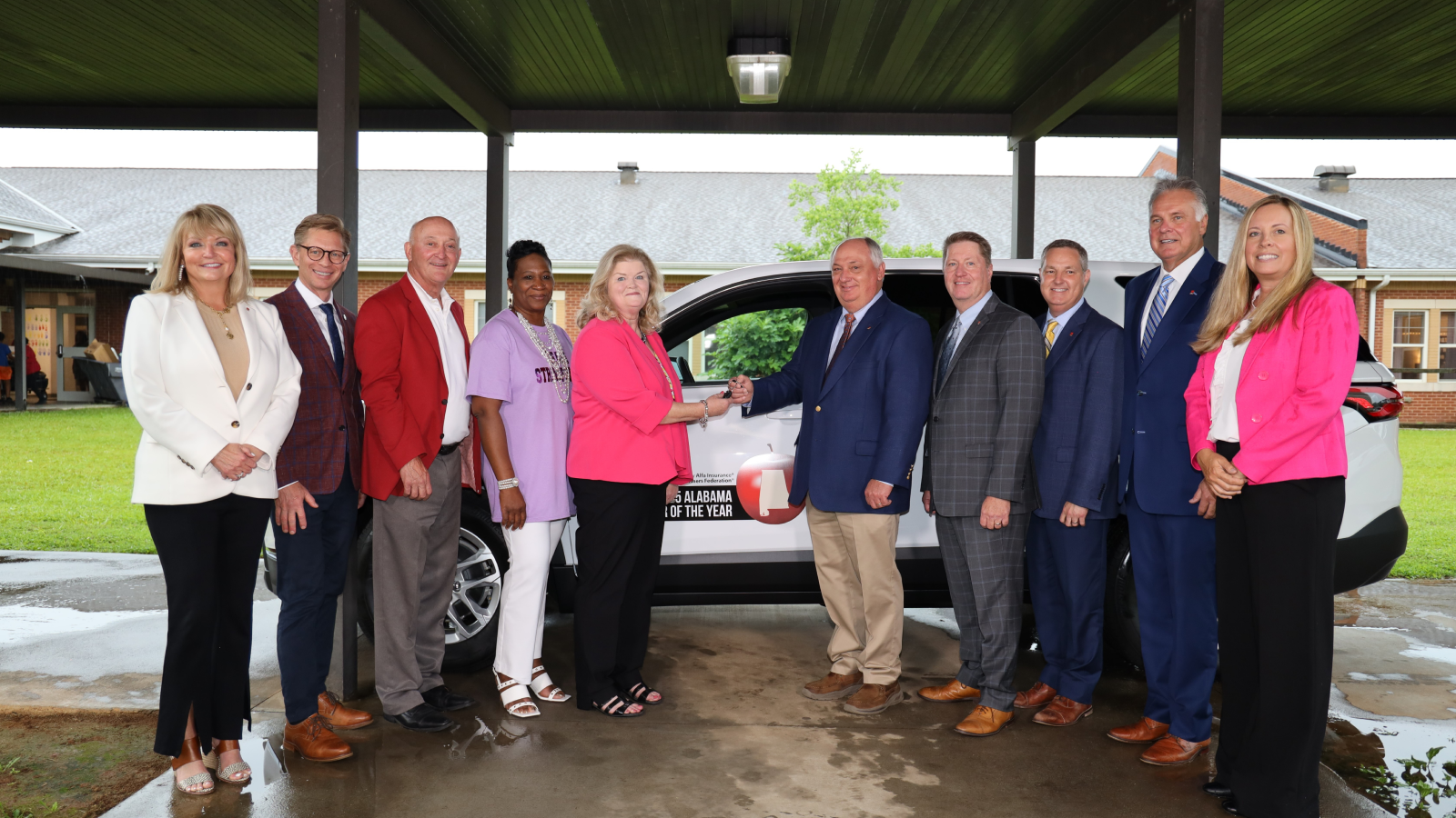 2024-2025 Teacher of the Year Deborah Stringfellow being presented with a new Chevy Traverse. 