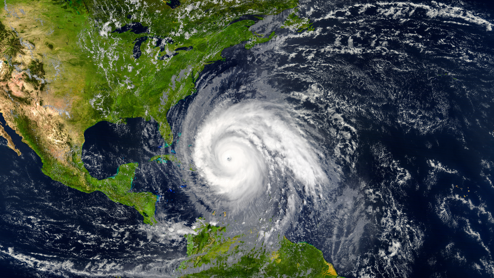 Digitally rendered image of a massive hurricane with a clearly defined eye approaching the southeastern United States.