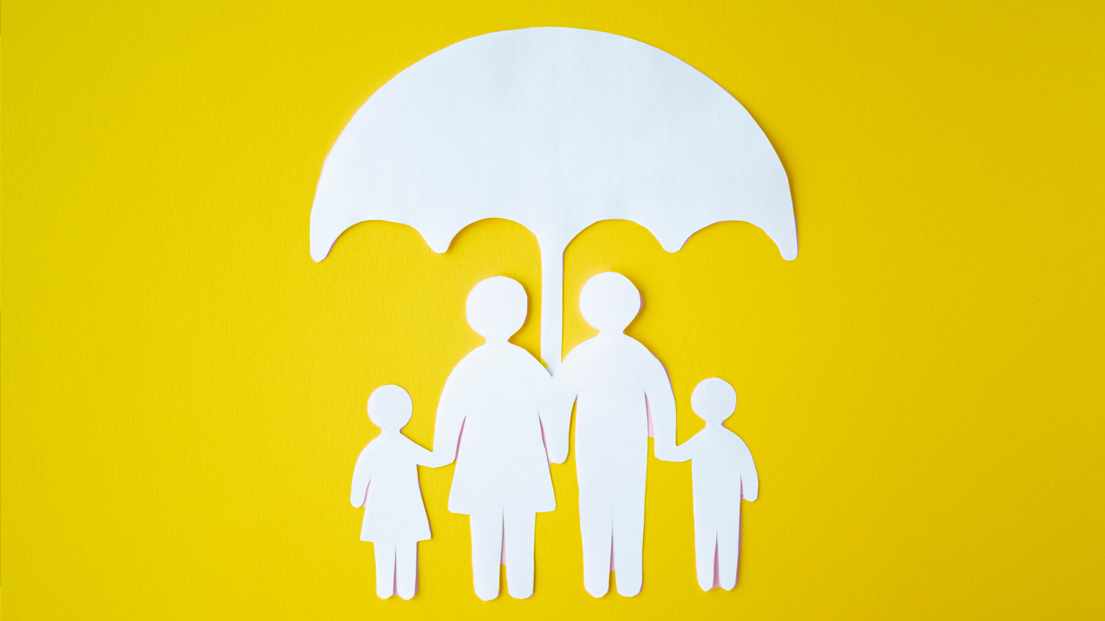 A picture a family under an umbrella.