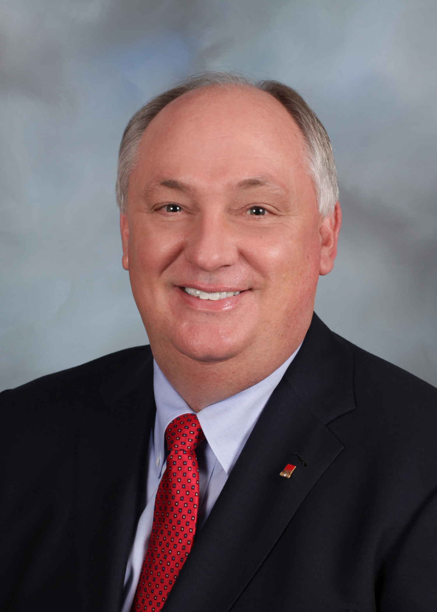Mr. Parnell's headshot photo.
